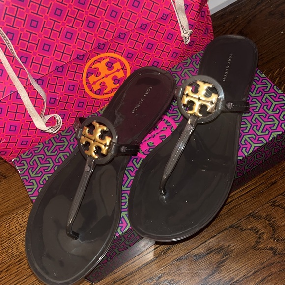 Tory Burch Glossy Brown Jelly Sandals with Gold Emblem - Picture 1 of 2